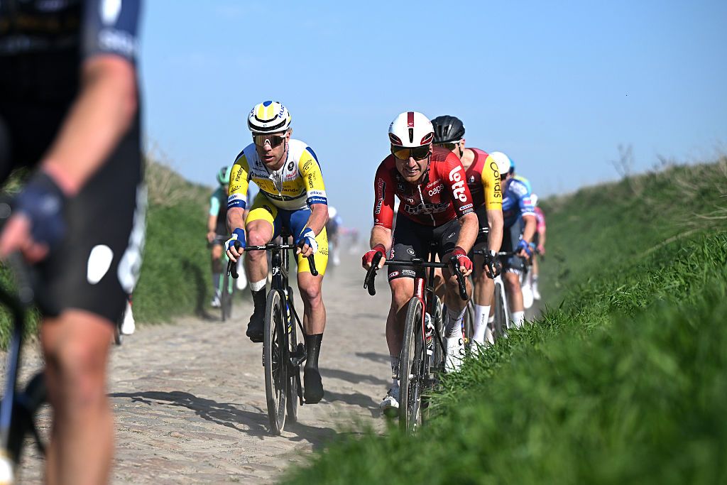 DENAIN, FRANCE - MARCH 19: (L-R) Jules Hesters of Belgium and Team Flanders - Baloise and Milan Menten of Belgium and Team Lotto Intermarché compete during the 67th Grand Prix de Denain - Porte du Hainaut 2026 a 200.4km one day race from Denain to Denain on March 19, 2026 in Denain, France. (Photo by Luc Claessen/Getty Images)