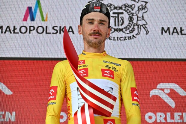 WIELICZKA, POLAND - AUGUST 10: Brandon McNulty of The United States and UAE Team Emirates - XRG celebrates at podium as Yellow Leader Jersey and final overall race winner during the 82nd Tour de Pologne 2025, Stage 7 a 12.5km individual time trial stage from Wieliczka to Wieliczka / #UCIWT / on August 10, 2025 in Wieliczka, Poland. (Photo by Luc Claessen/Getty Images)