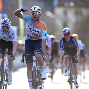 Ethan Vernon celebrates at finish line as stage winner ahead of Dorian Godon
