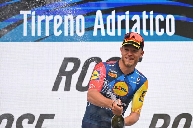 SAN BENEDETTO DEL TRONTO, ITALY - MARCH 15: Jonathan Milan of Italy and Team Lidl - Trek celebrates at podium as stage winner during the 61st Tirreno-Adriatico 2026, Stage 7 a 142km stage from Civitanova Marche to San Benedetto del Tronto / #UCIWT / on March 15, 2026 in San Benedetto del Tronto, Italy. (Photo by Tim de Waele/Getty Images)