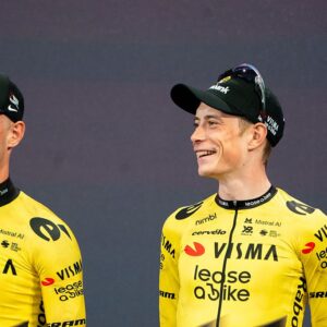 Victor Campenaerts literally Jonas Vingegaard's right-hand man as the two stand on the stage during the Giro d'Italia presentation