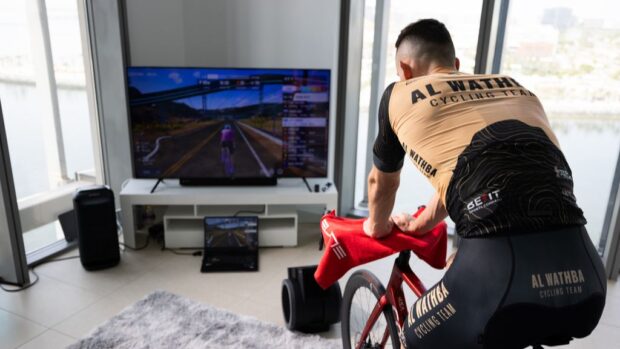 A rider using MyWhoosh indoors