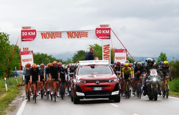 Italy's race director and former cyclist Marco Velo talks with rides after a crash during the 2nd stage of the Giro d'Italia 2026 - Tour of Italy cycling race between Burgas and Veliko Tarnovo, Bulgaria, on May 9, 2026. (Photo by Luca Bettini / AFP)