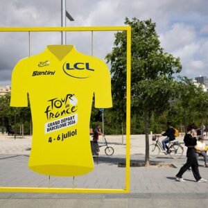 A display shaped like the Tour de France leader's yellow jersey promoting the race's 'Grand Depart' is pictured in Barcelona on May 7, 2026.