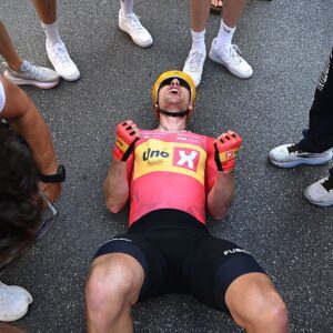 2026 Giro d'Italia stage 15: an exhausted Fredrik Dversnes celebrates the win
