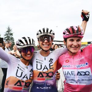 IMOLA, ITALY - JULY 13: (L-R) Erica Magnaldi of Italy, Brodie Chapman of Australia and overall race winner Elisa Longo Borghini of Italy and UAE Team ADQ - Pink Leader Jersey react after the 36th Giro d&amp;apos;Italia Women 2025, Stage 8 a 134km stage from Forli to Imola / #UCIWWT / on July 13, 2025 in Imola, Italy. (Photo by Luc Claessen/Getty Images)