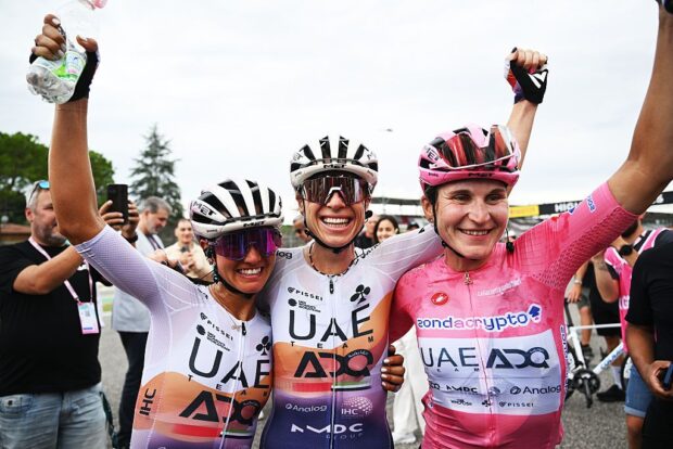 IMOLA, ITALY - JULY 13: (L-R) Erica Magnaldi of Italy, Brodie Chapman of Australia and overall race winner Elisa Longo Borghini of Italy and UAE Team ADQ - Pink Leader Jersey react after the 36th Giro d&amp;apos;Italia Women 2025, Stage 8 a 134km stage from Forli to Imola / #UCIWWT / on July 13, 2025 in Imola, Italy. (Photo by Luc Claessen/Getty Images)