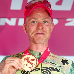 Valgren holds the medal for stage winner on the podium