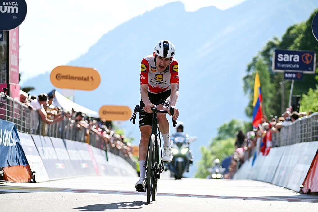 Derek Gee-West finishes stage 19 of the Giro d'Italia with a face full of pain