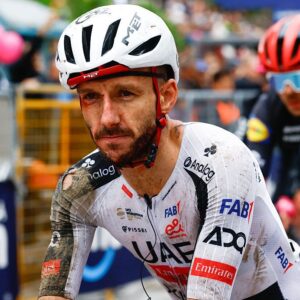 UAE Team Emirates - XRG British rider Adam Yates crossing the finish line after a crash in the 2nd stage of the Giro d'Italia 2026 - Tour of Italy cycling race between Burgas and Veliko Tarnovo, Bulgaria, on May 9, 2026. (Photo by Luca Bettini / AFP)