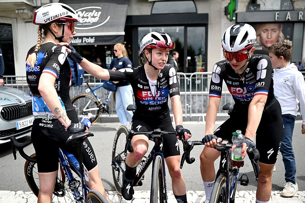 SAN SEBASTIAN, SPAIN - MAY 17: (L-R) Evita Muzic of France, Lauren Dickson of Great Britain and Juliette Berthet of France and Team FDJ United - SUEZ react after the 5th Itzulia Women 2026, Stage 3 a 131.1km stage from San Sebastian to San Sebastian / #UCIWWT / on May 17, 2026 in San Sebastian, Spain. (Photo by Szymon Gruchalski/Getty Images)