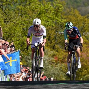 Tadej Pogacar and Paul Seixas of France and Team Decathlon CMA CGM compete in the breakaway climbing the Cote de la Redoute (292m) during the 112th Liege - Bastogne - Liege 2026
