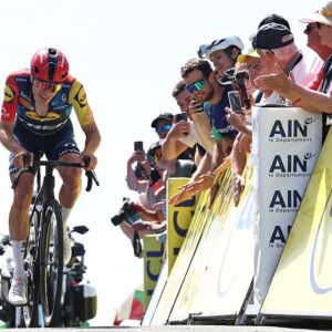 Lidl-Trek's Spanish rider Juan Ayuso cycles to the finish line of the 7th stage of the Tour Auvergne-Rhone-Alpes cycling race (formerly known as the Criterium du Dauphine), 133,6km between La Bridoire and Grand Colombier in the French Alps on June 13, 2026. (Photo by Anne-Christine POUJOULAT / AFP)