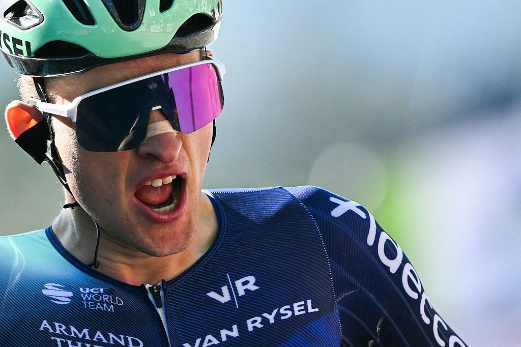 Paul Seixas celebrates as he crosses the finish line to win La Fleche Wallonne