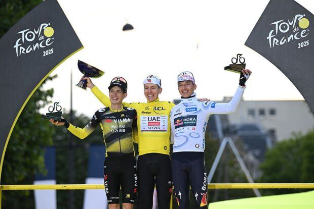 TDF 2025 race winner Tadej Pogačar on top of the podium