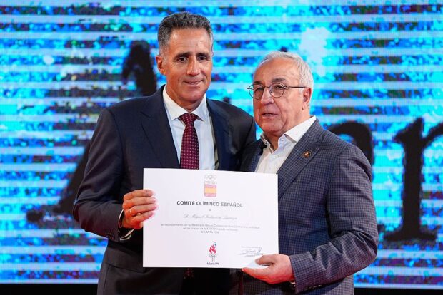 Miguel Indurain receives an award from Alejandro Blanco, President of the Spanish Olympic Committee, for the 30th anniversary of his 1996 Olympic TT gold medal