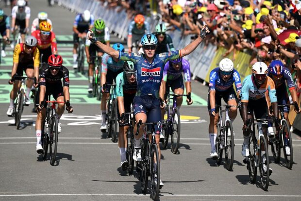 Tim Merlier celebrates at finish line as stage winner ahead of Biniam Girmay during the 113th Tour de France 2026, Stage 8 a 180.4km stage from Perigueux to Bergerac