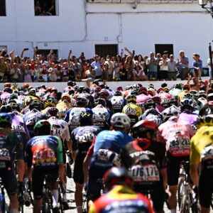 A general view of the peloton competing prior to the La Vuelta - 81st Tour of Spain 2026, Stage 16 a 181.1km stage from Cortegana to Monasterio de La Rabida - Palos de la Frontera